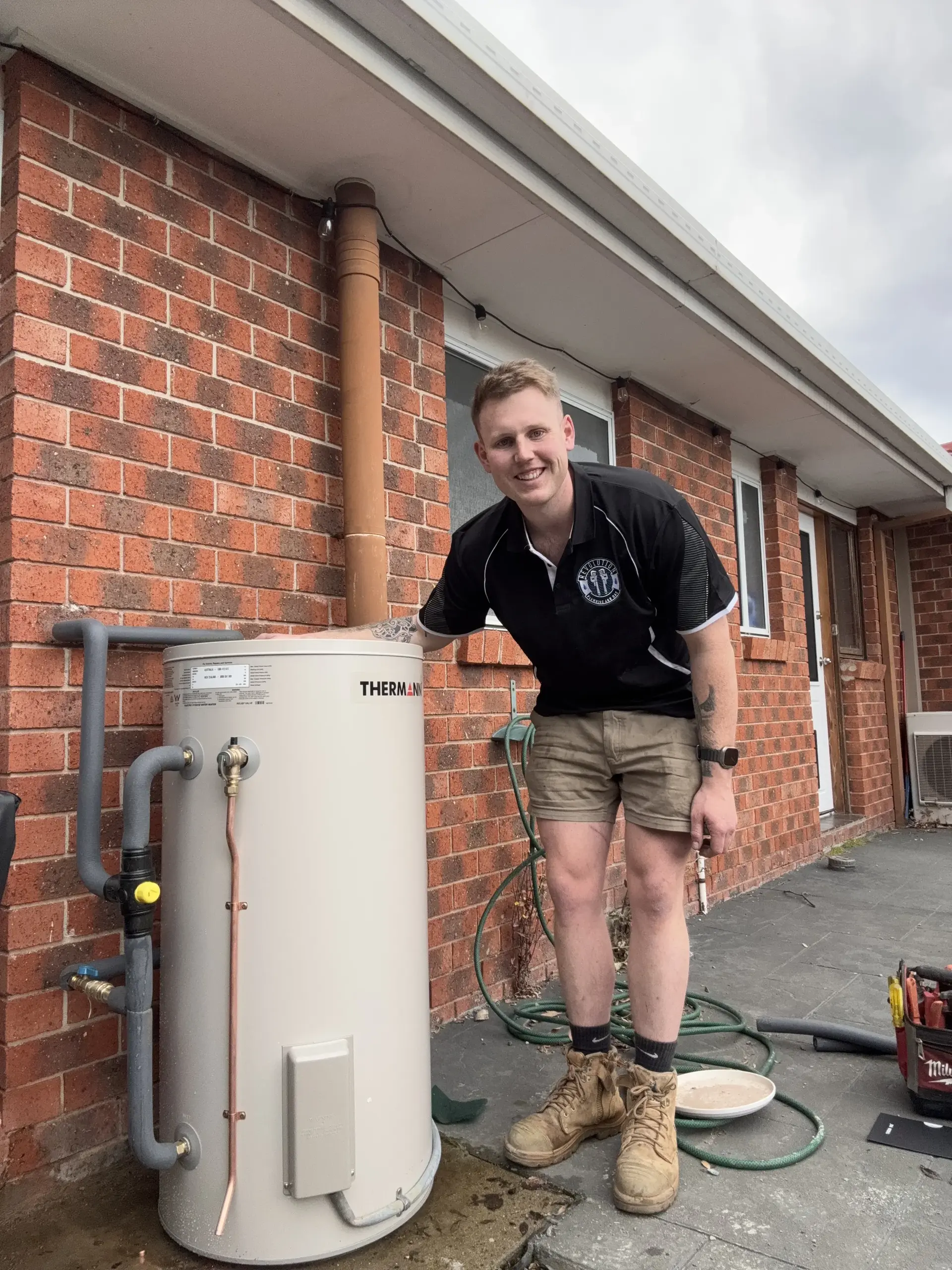 Professional plumber at work