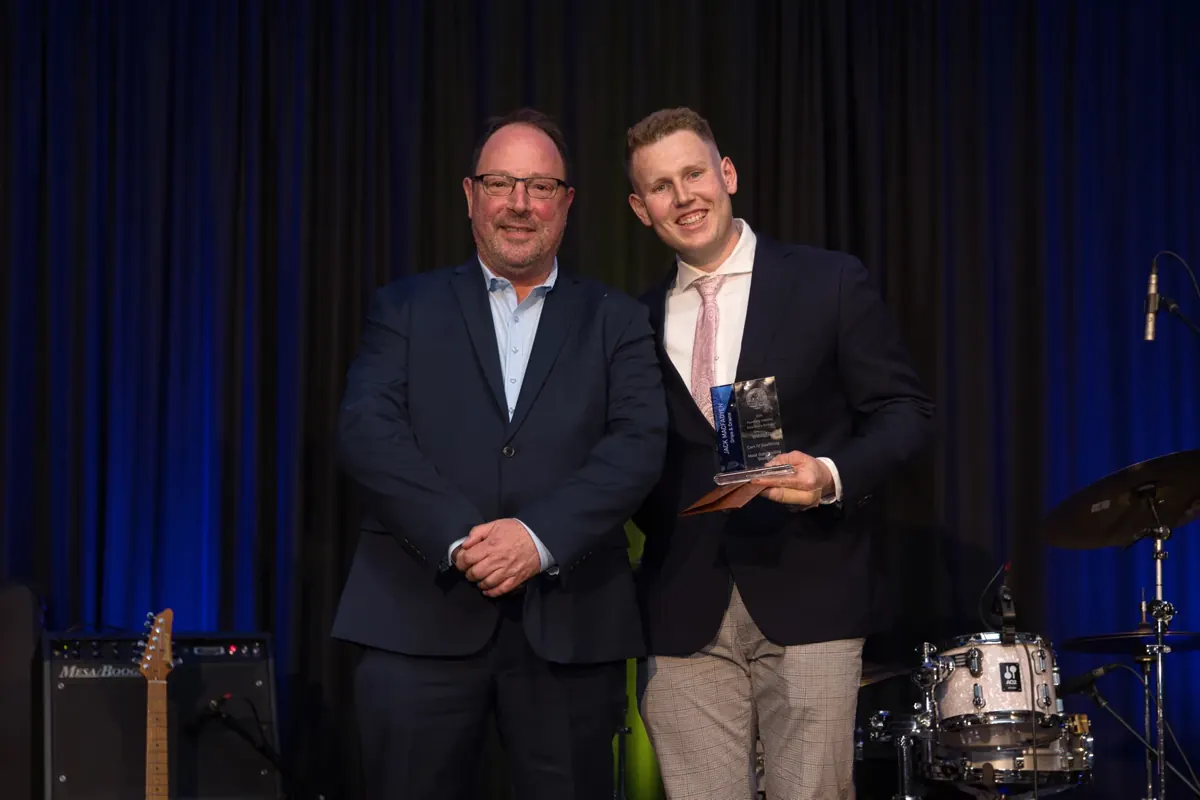 Jack Macfadyen receiving Master Plumbers award in Canberra
